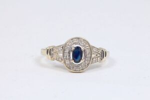  10k White Gold Oval Sapphire in Diamond Halo Ring
